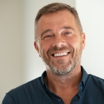 Portrait of happy mature man smiling