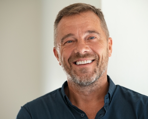 Portrait of happy mature man smiling