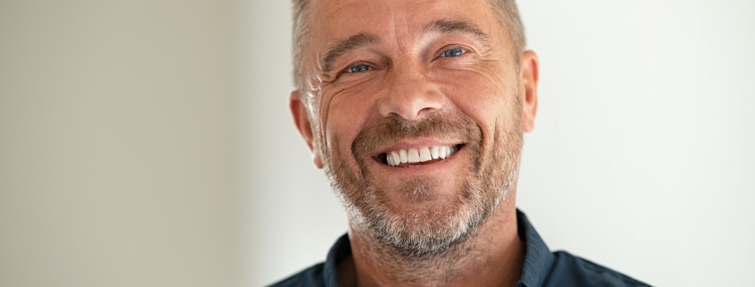 Portrait of happy mature man smiling